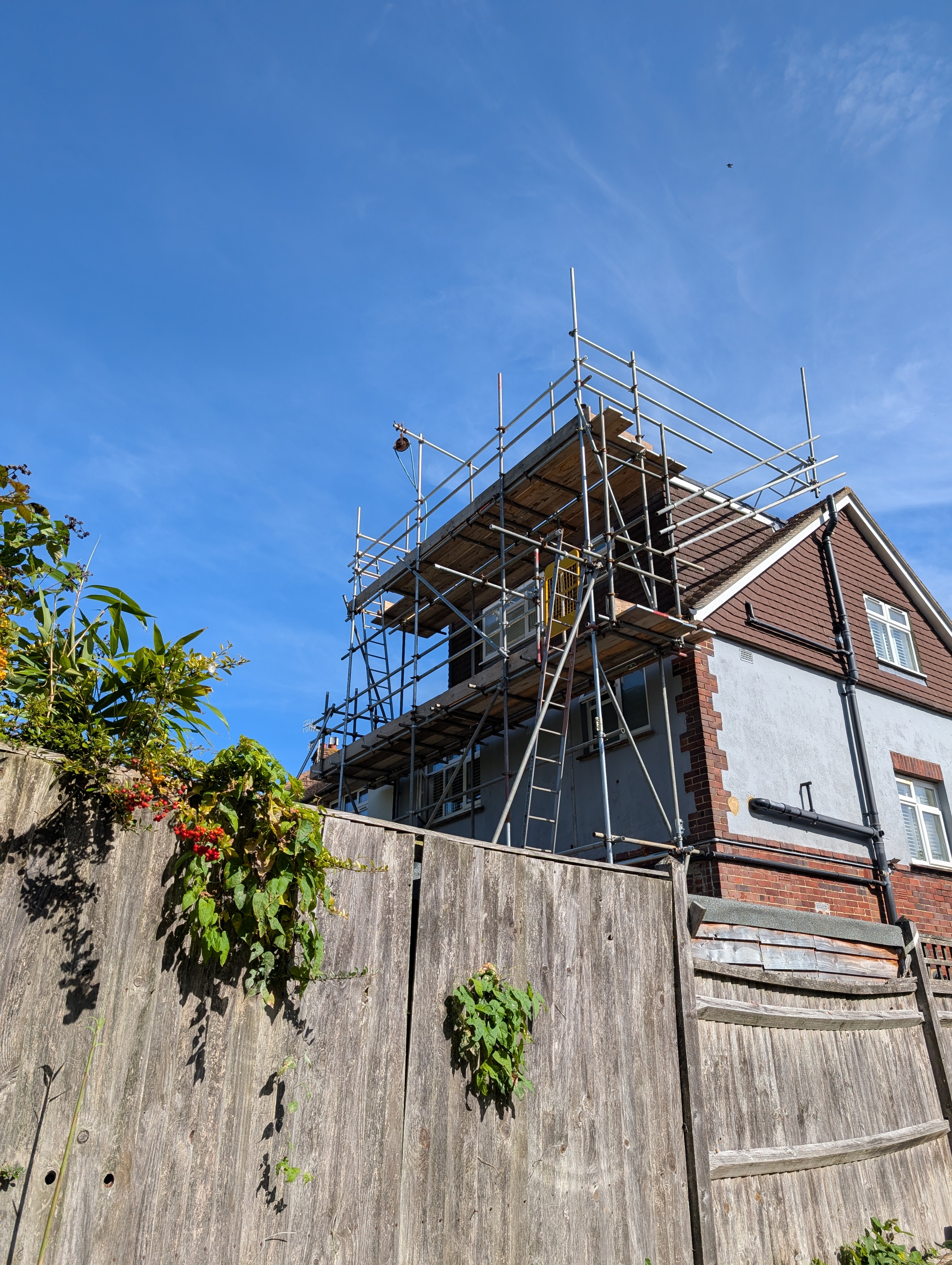 Scaffolding around a house extension