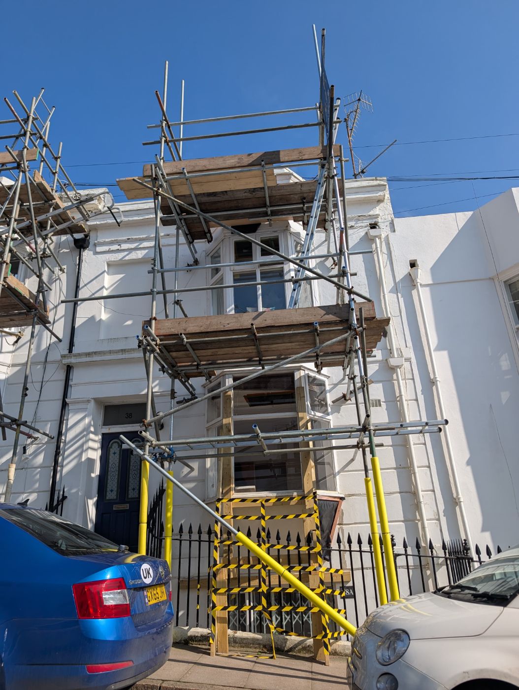 HTK scaffold providing platform access for window fitting on a terraced house